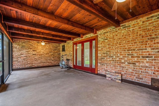 unfurnished sunroom featuring french doors, beam ceiling, wood ceiling, and ceiling fan