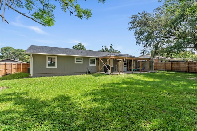 3016 Reiter Dr, Auburndale, FL 33823 - back of property featuring a patio area and a yard