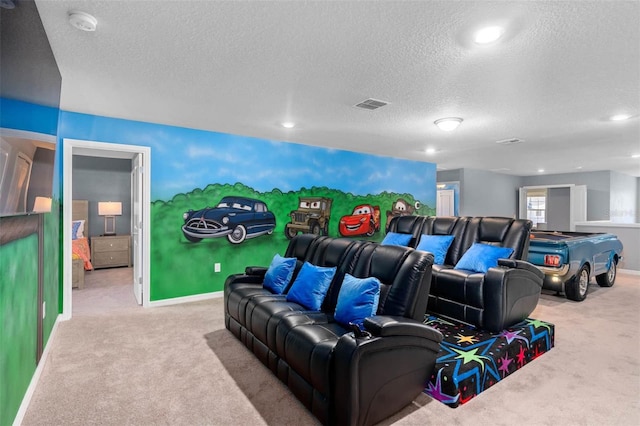 carpeted cinema room featuring a textured ceiling