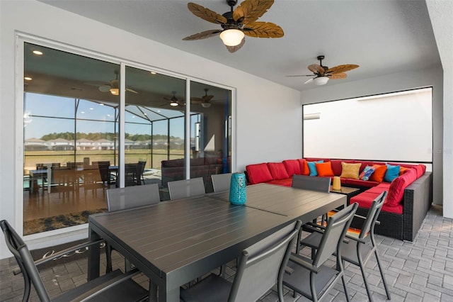 view of patio featuring an outdoor hangout area and ceiling fan