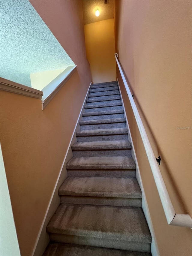 stairs with baseboards