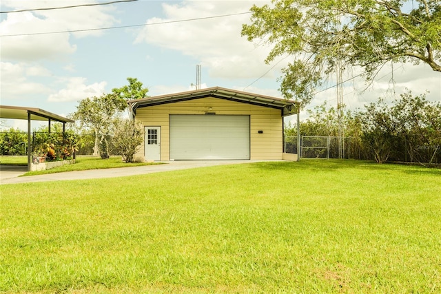 garage featuring a yard