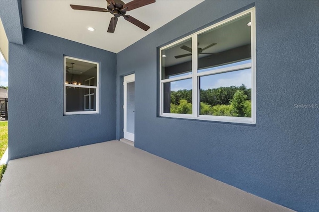 view of patio / terrace featuring ceiling fan