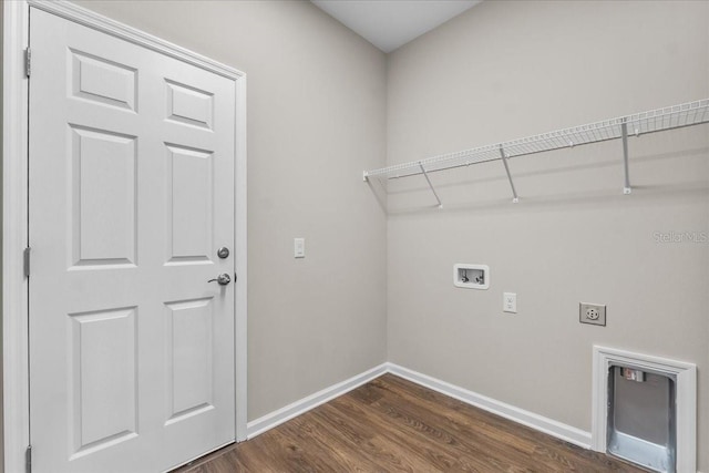 clothes washing area with hookup for an electric dryer, washer hookup, dark wood-style floors, baseboards, and laundry area
