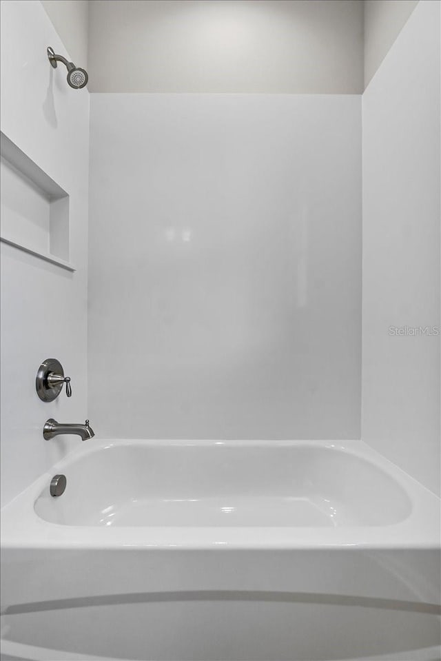 bathroom featuring shower / bath combination