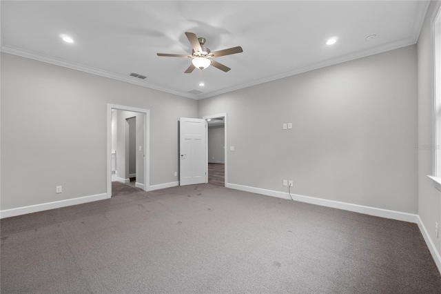 unfurnished bedroom featuring ornamental molding, baseboards, and visible vents