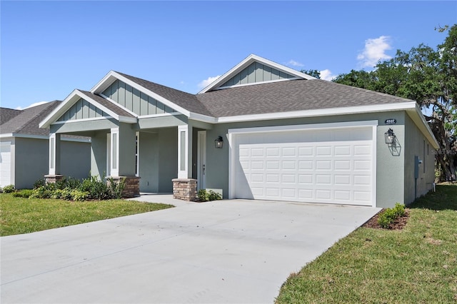 4537 Fairway Oaks Dr, Mulberry, FL 33860 - craftsman house featuring roof with shingles, driveway, board and batten siding, and an attached garage