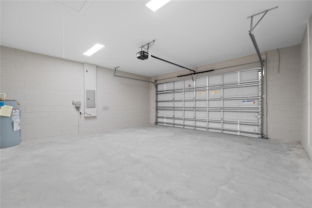 4537 Fairway Oaks Dr, Mulberry, FL 33860 - garage featuring a garage door opener, concrete block wall, electric panel, and water heater