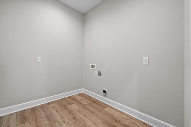 4537 Fairway Oaks Dr, Mulberry, FL 33860 - washroom with baseboards, light wood finished floors, laundry area, and washer hookup