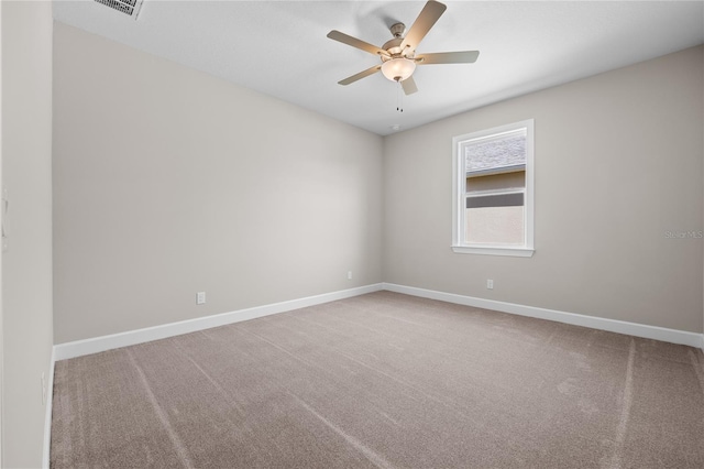 4537 Fairway Oaks Dr, Mulberry, FL 33860 - unfurnished room with baseboards, a ceiling fan, and carpet