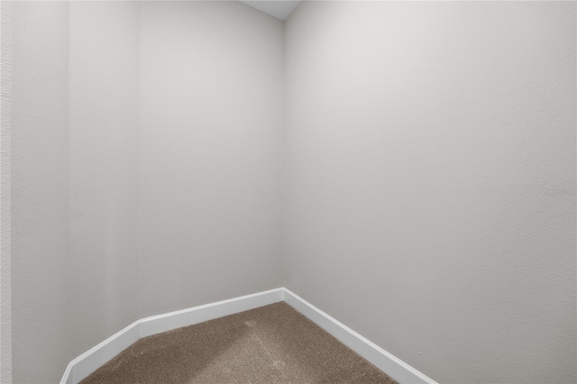 4537 Fairway Oaks Dr, Mulberry, FL 33860 - interior space featuring dark colored carpet and baseboards