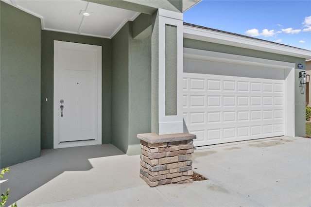 4537 Fairway Oaks Dr, Mulberry, FL 33860 - property entrance featuring driveway and stucco siding