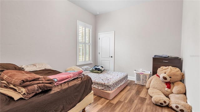 bedroom featuring light hardwood / wood-style floors