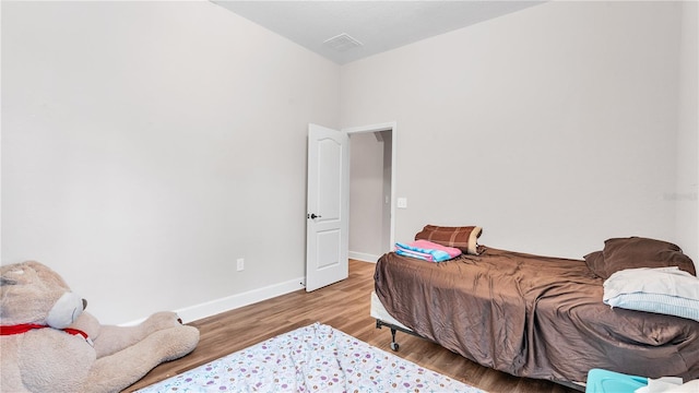 bedroom featuring light hardwood / wood-style flooring