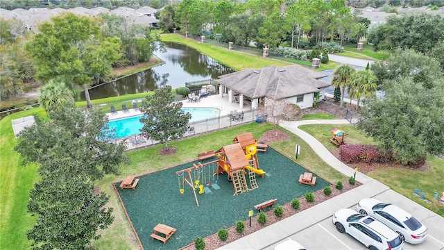 birds eye view of property featuring a water view