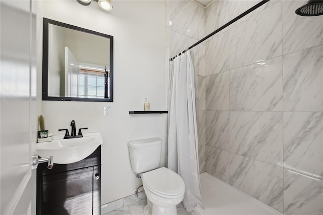 full bathroom with toilet, marble finish floor, and vanity