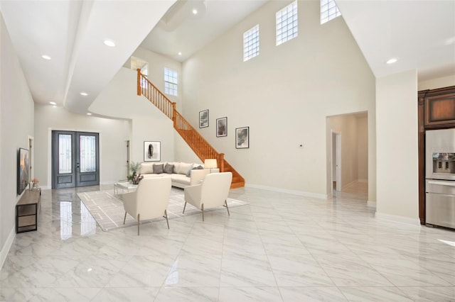 living room featuring recessed lighting, baseboards, stairs, marble finish floor, and french doors