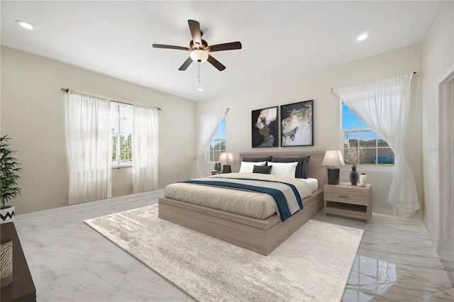 bedroom featuring a ceiling fan, recessed lighting, and marble finish floor