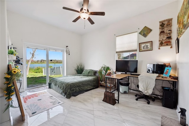 bedroom with a ceiling fan, access to outside, and marble finish floor