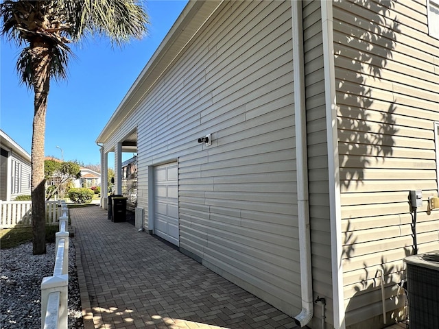 view of home's exterior with central AC