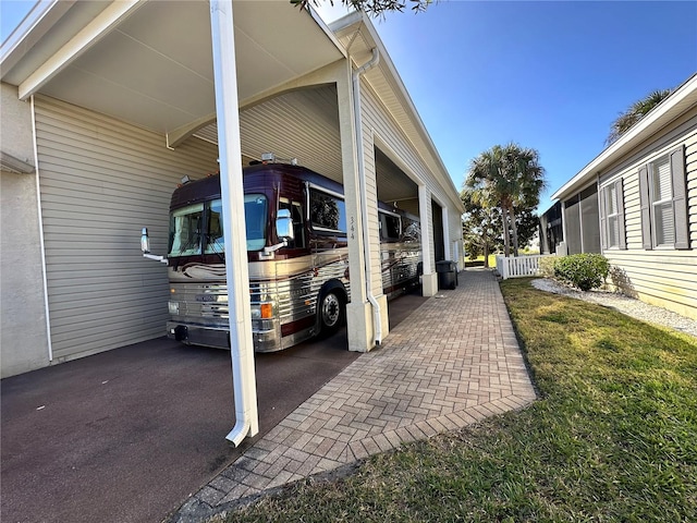 view of parking featuring a carport