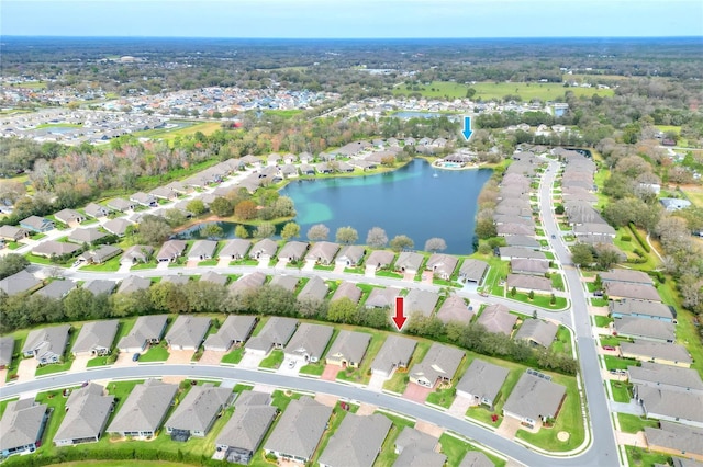 bird's eye view with a water view