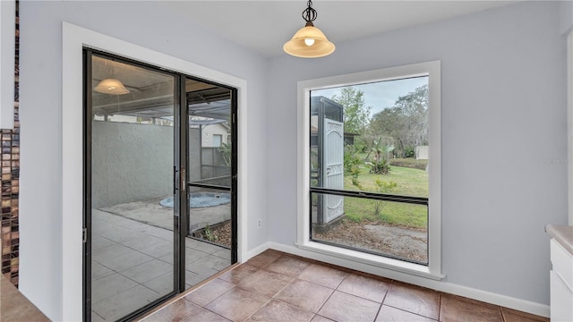 doorway featuring light tile flooring