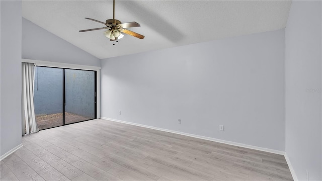 spare room featuring high vaulted ceiling, ceiling fan, and light hardwood / wood-style flooring