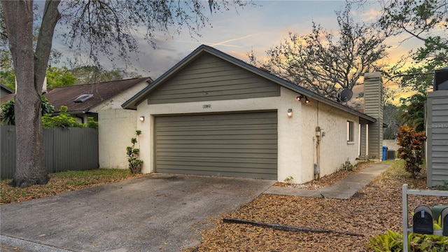 exterior space with a garage