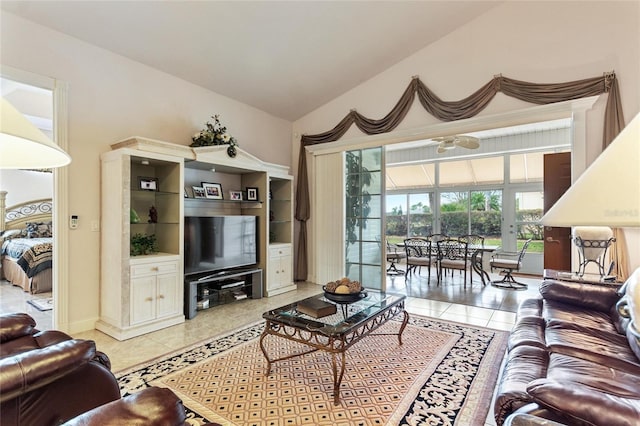 tiled living room with lofted ceiling