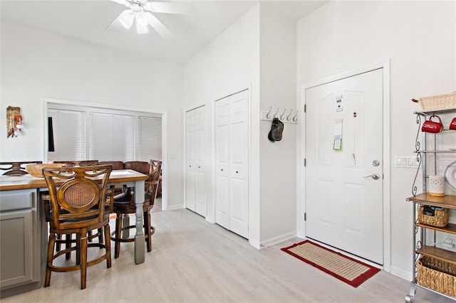 dining area featuring ceiling fan and light hardwood / wood-style flooring