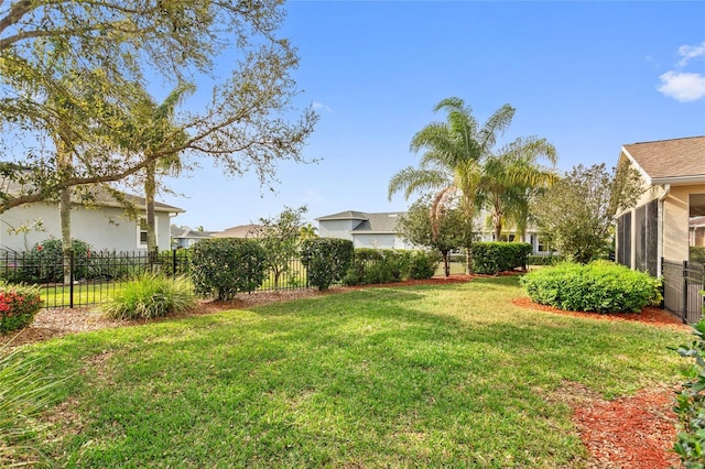 view of yard with a sunroom