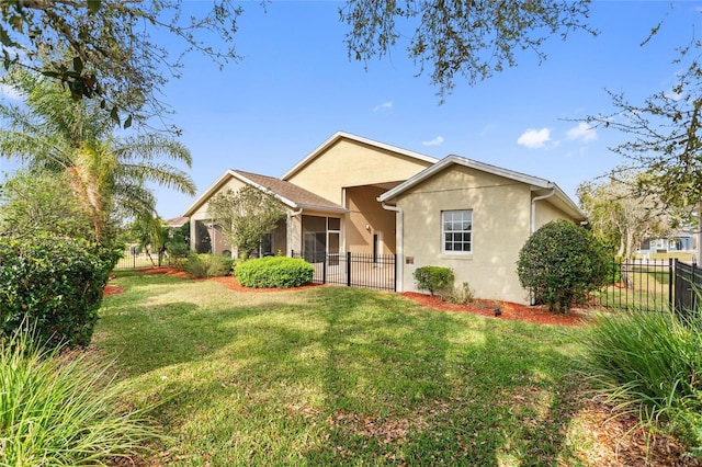 view of front facade with a front yard