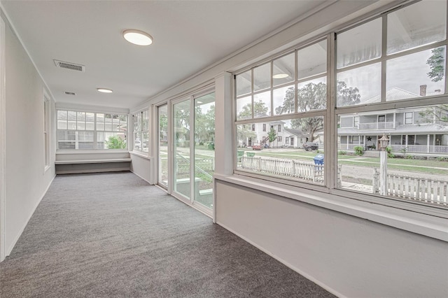 view of unfurnished sunroom