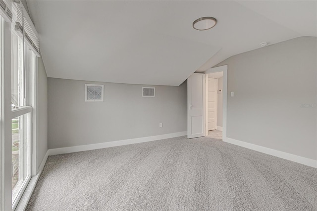 interior space with vaulted ceiling