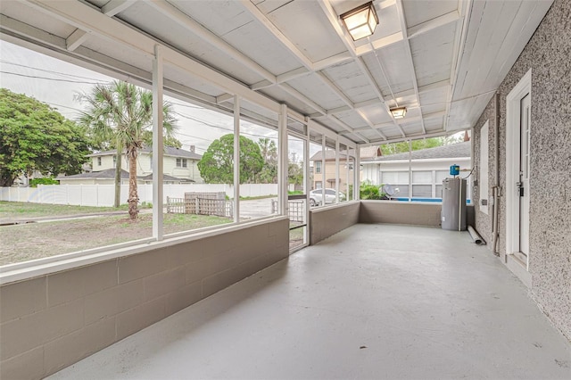 sunroom featuring water heater