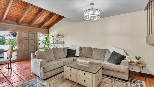 tiled living room featuring a notable chandelier, vaulted ceiling with beams, and wooden ceiling