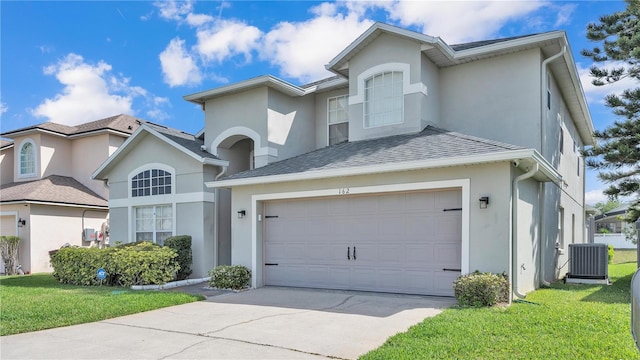 front of property featuring central AC and a front yard