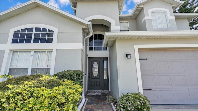 property entrance featuring a garage