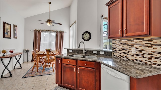 kitchen with ceiling fan, sink, light tile floors, dishwasher, and tasteful backsplash