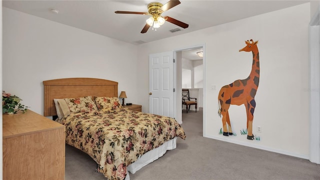 bedroom with light colored carpet and ceiling fan