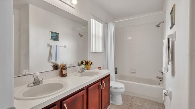 full bathroom with toilet, vanity with extensive cabinet space, dual sinks, tile floors, and shower / tub combo with curtain