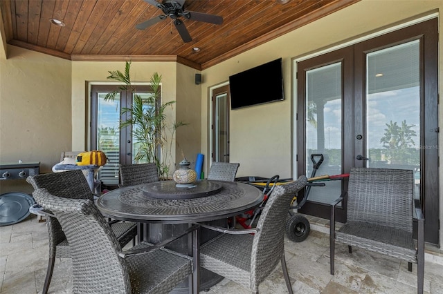 view of terrace featuring ceiling fan