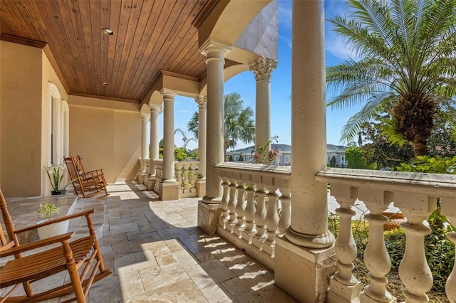 view of patio with a balcony