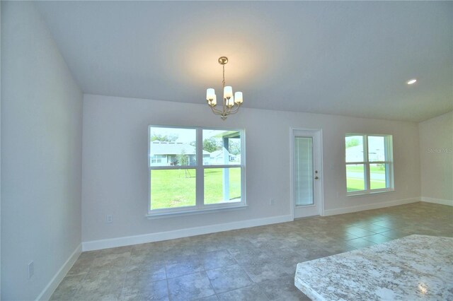 interior space with a chandelier and light tile patterned floors