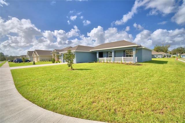 single story home with covered porch and a front lawn