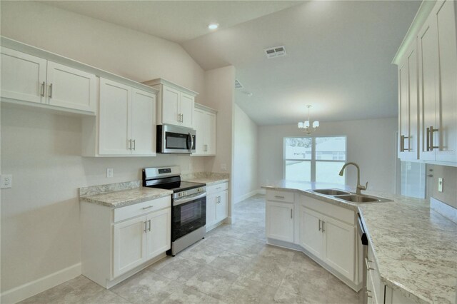 kitchen with white cabinetry, sink, stainless steel appliances, lofted ceiling, and decorative light fixtures