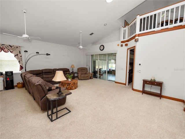 living room with ceiling fan, light colored carpet, and high vaulted ceiling