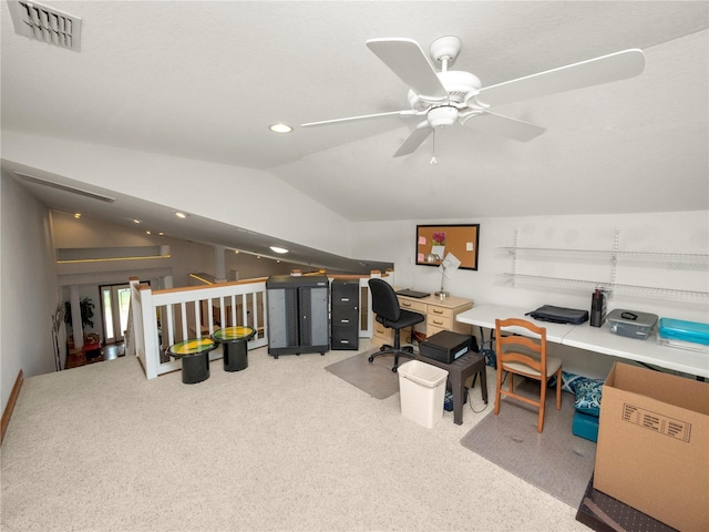 office space featuring light carpet, ceiling fan, and lofted ceiling