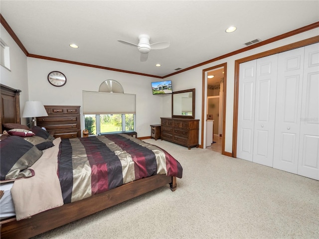 bedroom with light carpet, a closet, ceiling fan, and crown molding